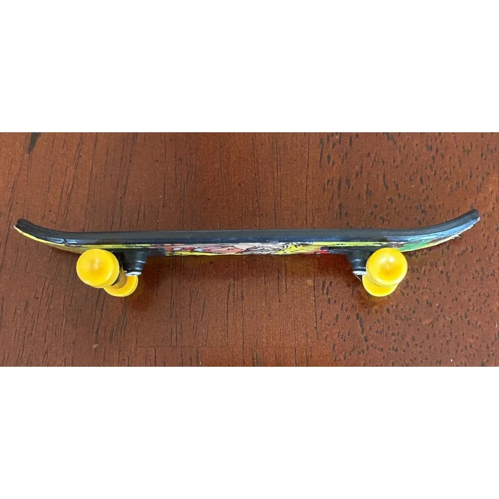 DGK Jester Fingerboard Tech Deck Toy Yellow Wheels Clown Graphic Miniature Skate